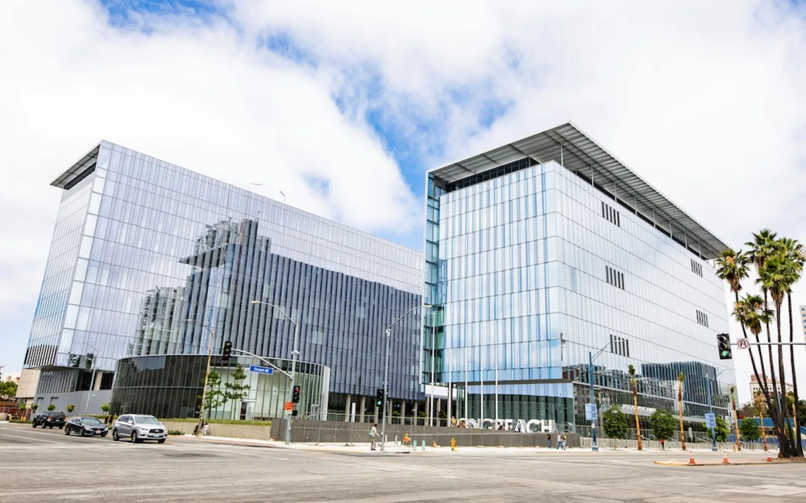 The modernist architecture of a civic center complex with clear geometric lines and a contemporary public plaza